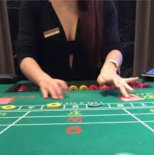 Filipino sports fan watching PBA game while betting on em777 casino mobile